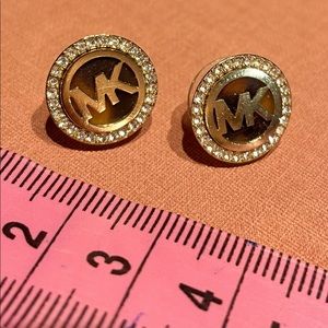 Pair of michael kors gold stud earrings